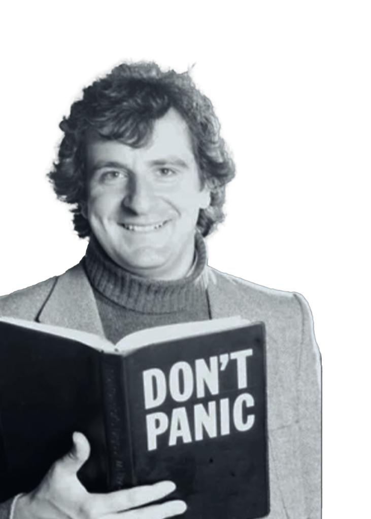 Douglas Adams holding a book with Don’t Panic on the cover